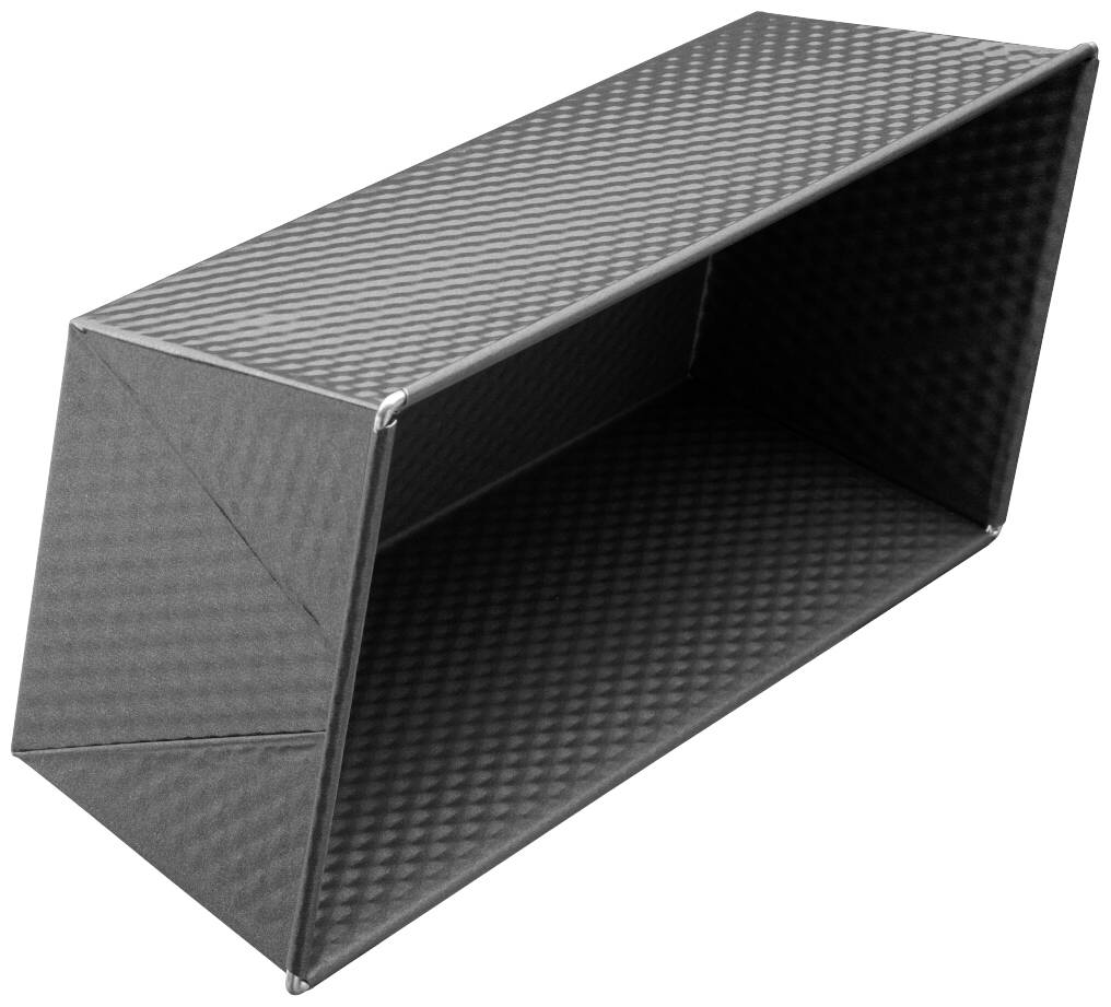 'Rectangular black baking tin with diamond pattern, empty and photographed from an angled overhead view.'