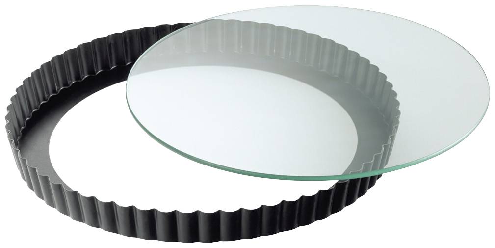 Round tart tin with a fluted edge and removable glass base, ideal for baking tarts and quiches.