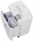 A white paper shredder with an open collection bin, filled with shredded paper. Control panel with buttons and indicator lights visible.