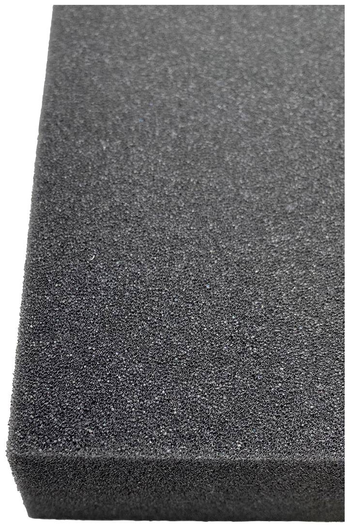 A rectangular, black foam block with a rough texture.