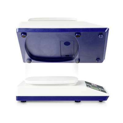 A laboratory device with blue and white colouration, possibly a moisture analyser, is standing on a white surface.