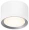 A round, white ceiling light with a metallic inner ring. It emits warm light, suitable for modern interior design.