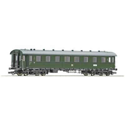 A historic, green passenger carriage of Deutsche Bahn with the 'DB' inscription, shown from the side.