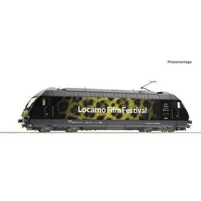 Locomotive with a 'Locarno Film Festival' inscription and leopard print on the side, symbolising creativity and film culture.