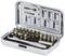 'Small tool set with a ratchet and various screwdriver bits in an open metal case, detailed image of the bits inside the lid.'