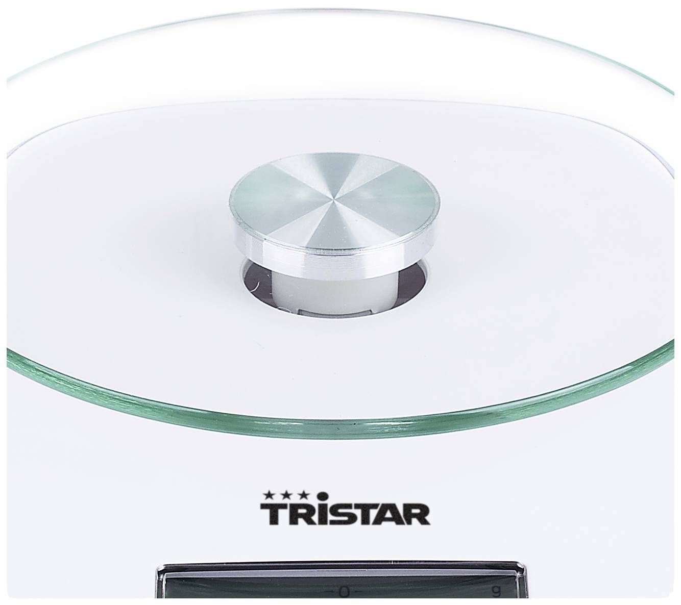Kitchen scales with a glass surface and round silver button, brand 'Tristar'.