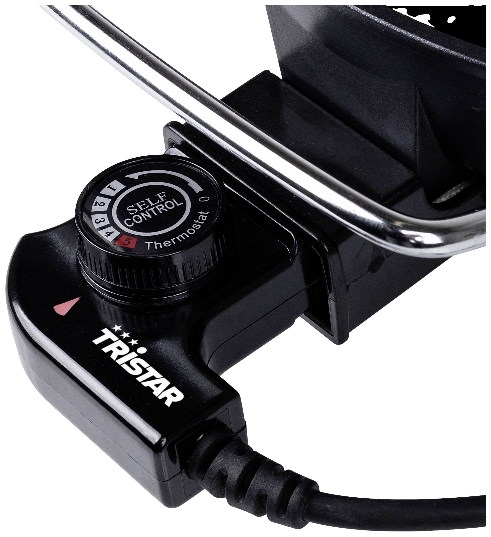 Thermostat with control dial on a device, showing the 'Tristar' brand. Dial set to level 5. Black plastic and metal casing.