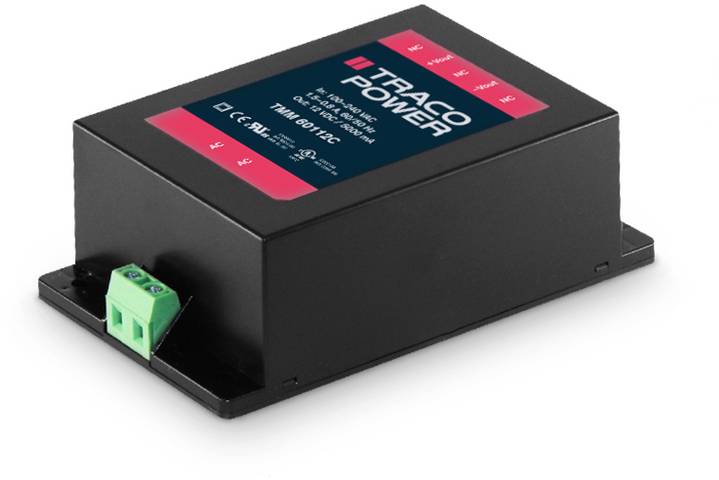 Black electronic device with red and black 'TRACO POWER' label, green terminal connector on the left side.