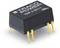 A Traco Power TDR 2-0511 voltage converter with four golden pins, suitable for use in electronic circuits.