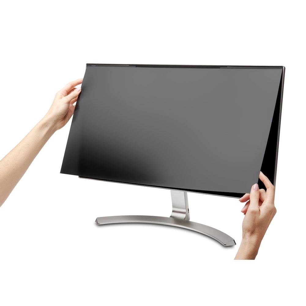 Two hands are holding a black privacy screen that is placed over a computer monitor to ensure privacy.