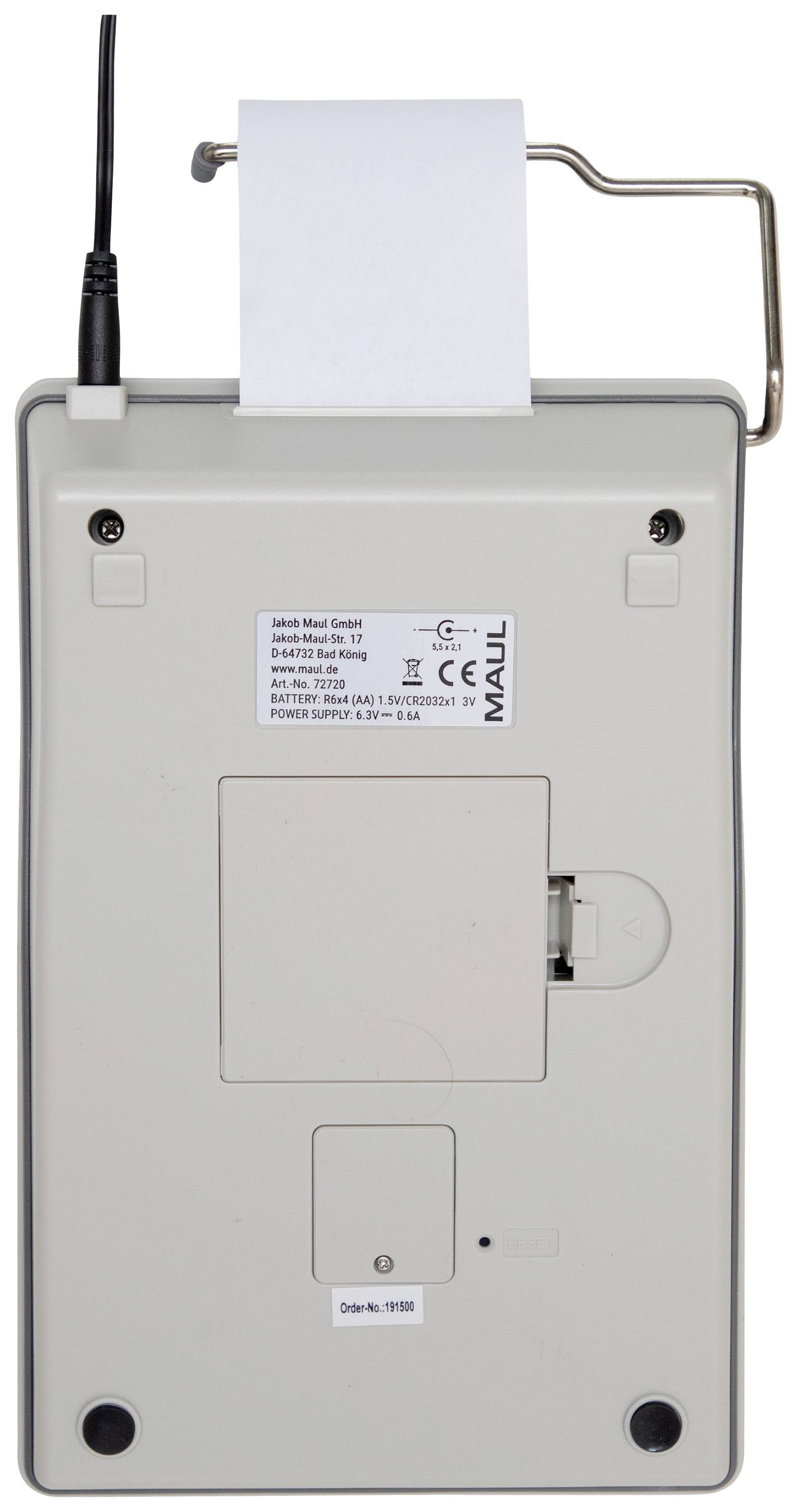 Back of an electronic device with paper roll and connection cable. Suitable for professional use.