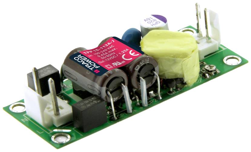 'Small green electronic circuit board mounted with capacitors, resistors and other components. Serves as a power supply.'