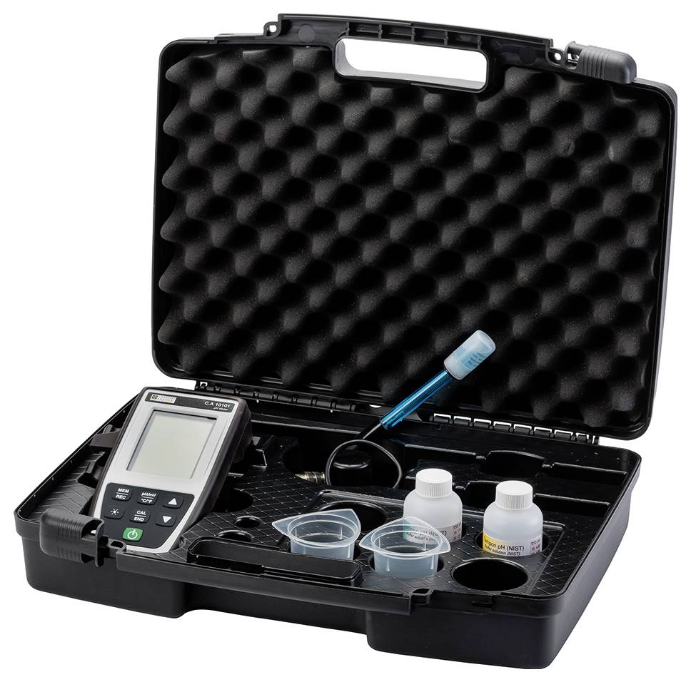 Portable water testing device in an open case with screen, test strips, liquids and containers for water analysis.