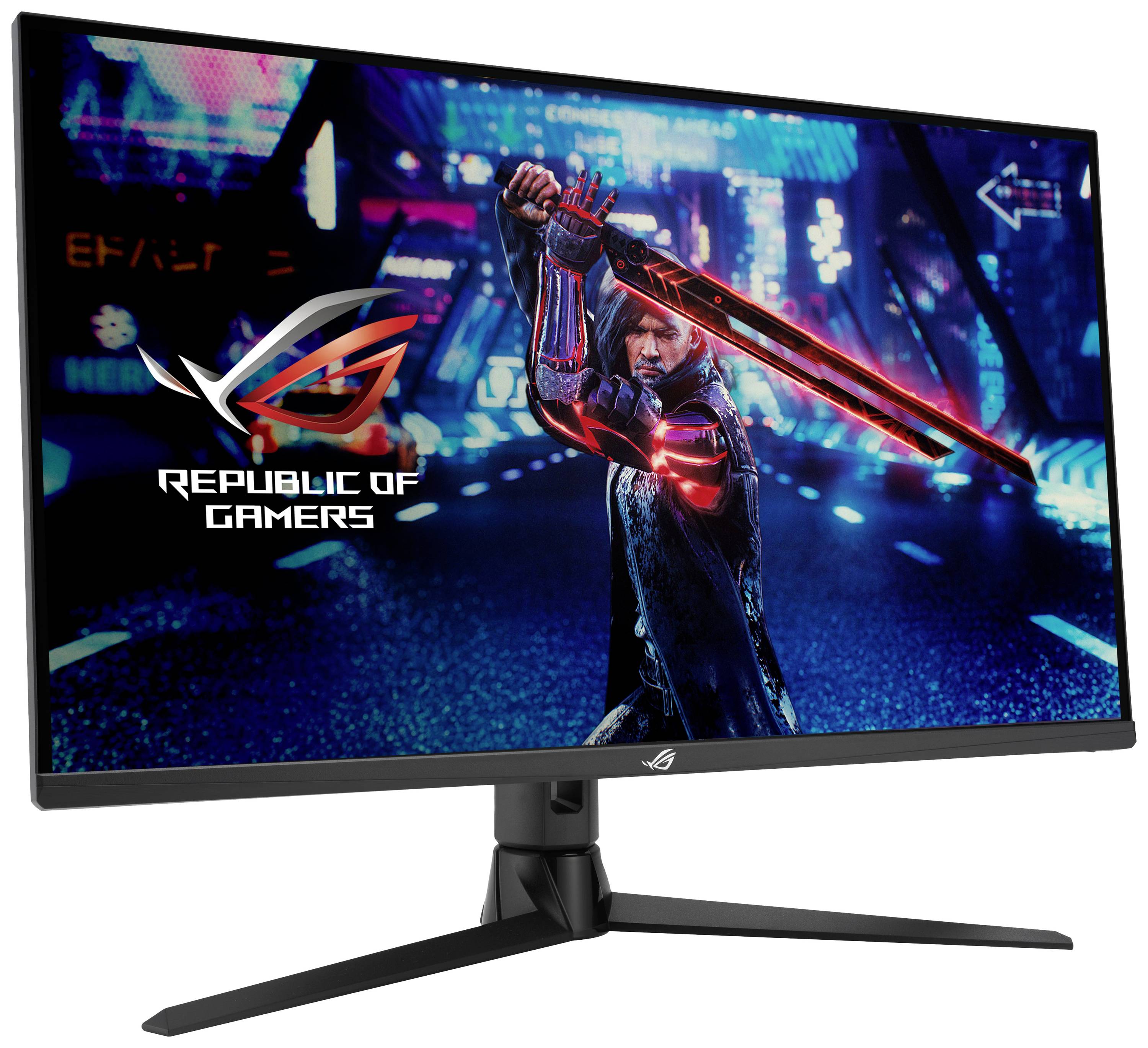 A gaming monitor displays the 'Republic of Gamers' logo on a sci-fi background with a figure holding a glowing sword.