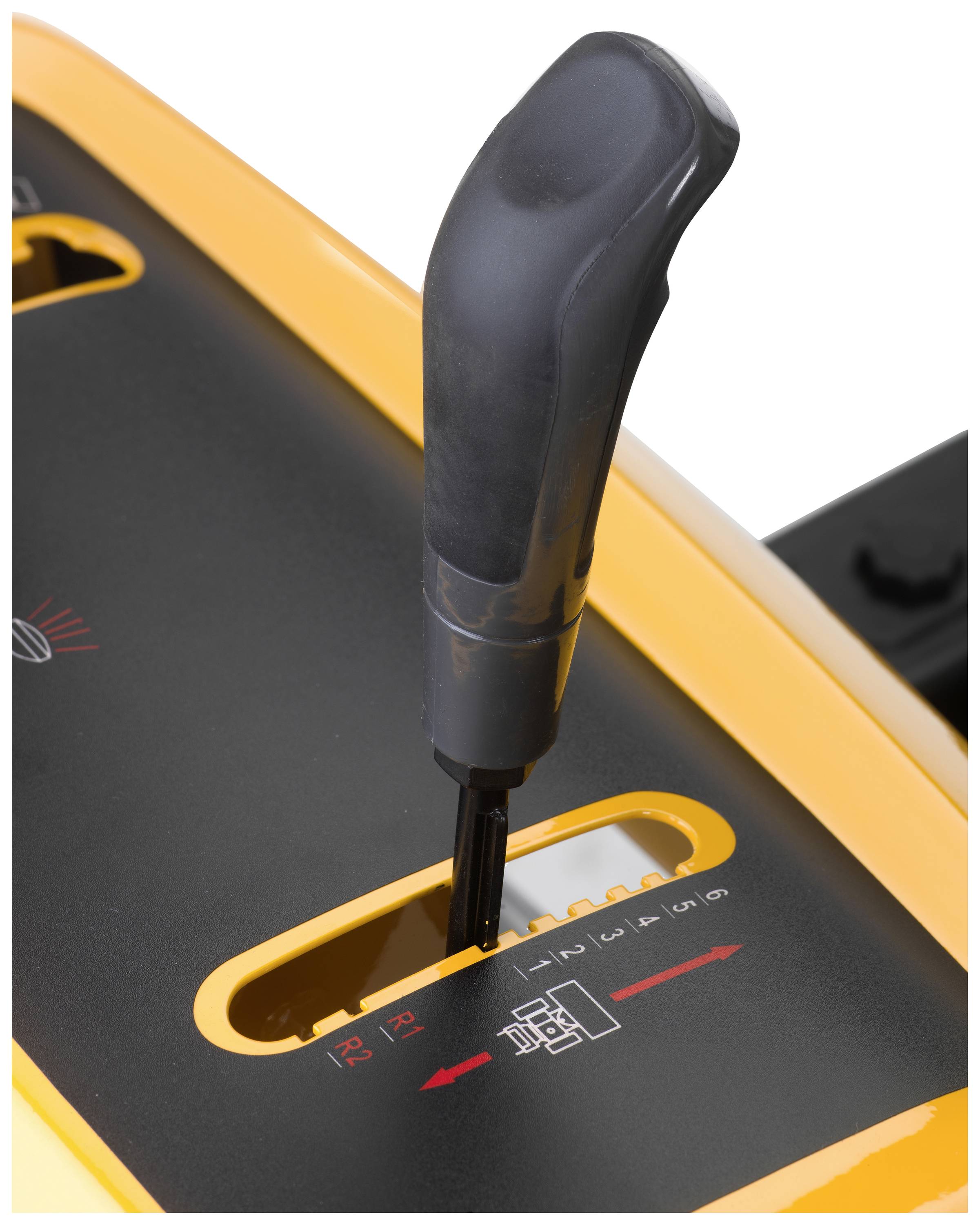 Close-up of a black gear lever on a yellow machine with a symbolic gearbox diagram and numbers: 1, 2, 3, N, R.