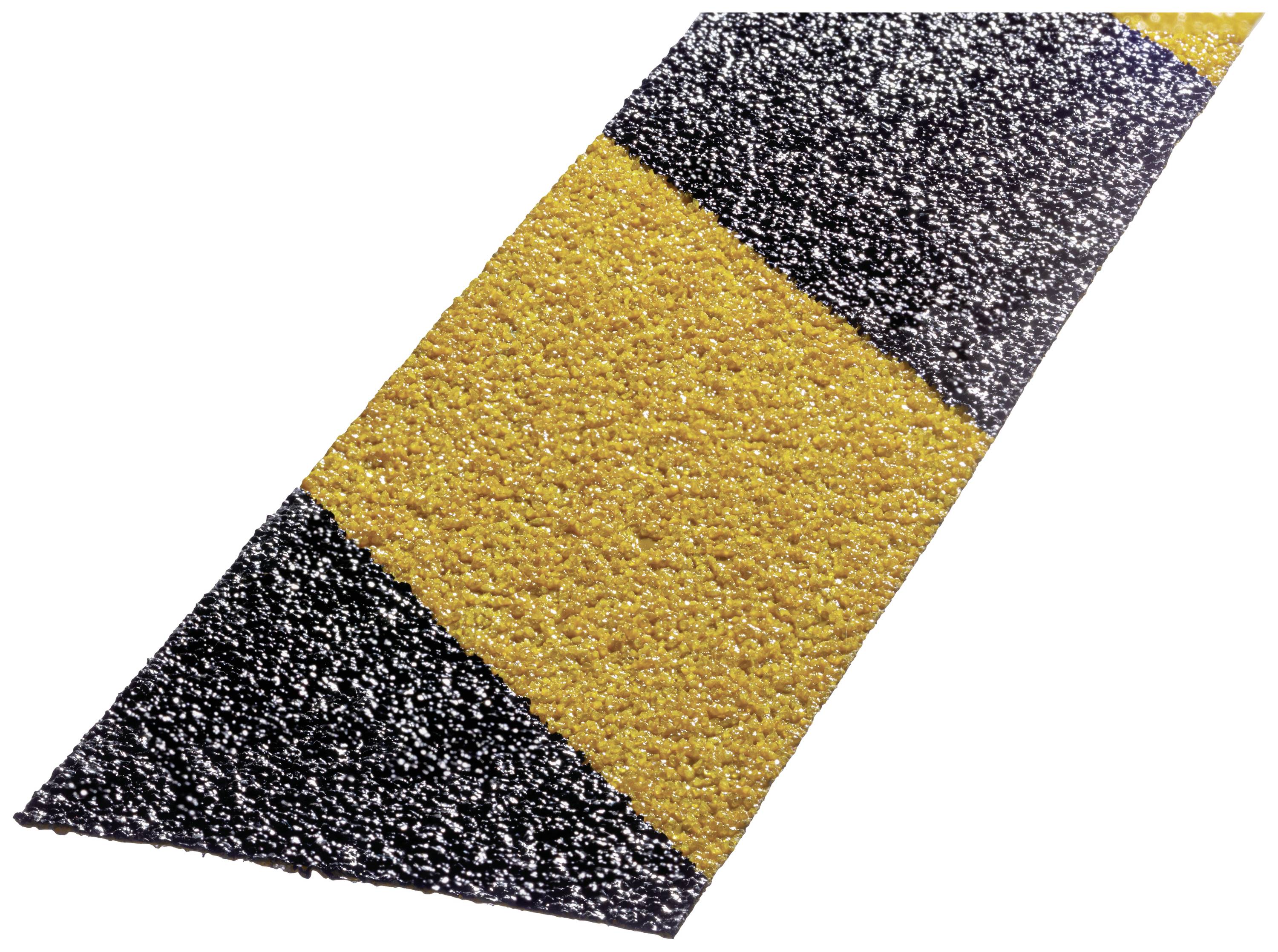 Black and yellow non-slip stripes on a safety floor covering.