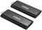 Two black, rectangular HDMI dongles from the brand 'SPEAKA Professional', marked with 'RX' and 'TX' on a white surface.