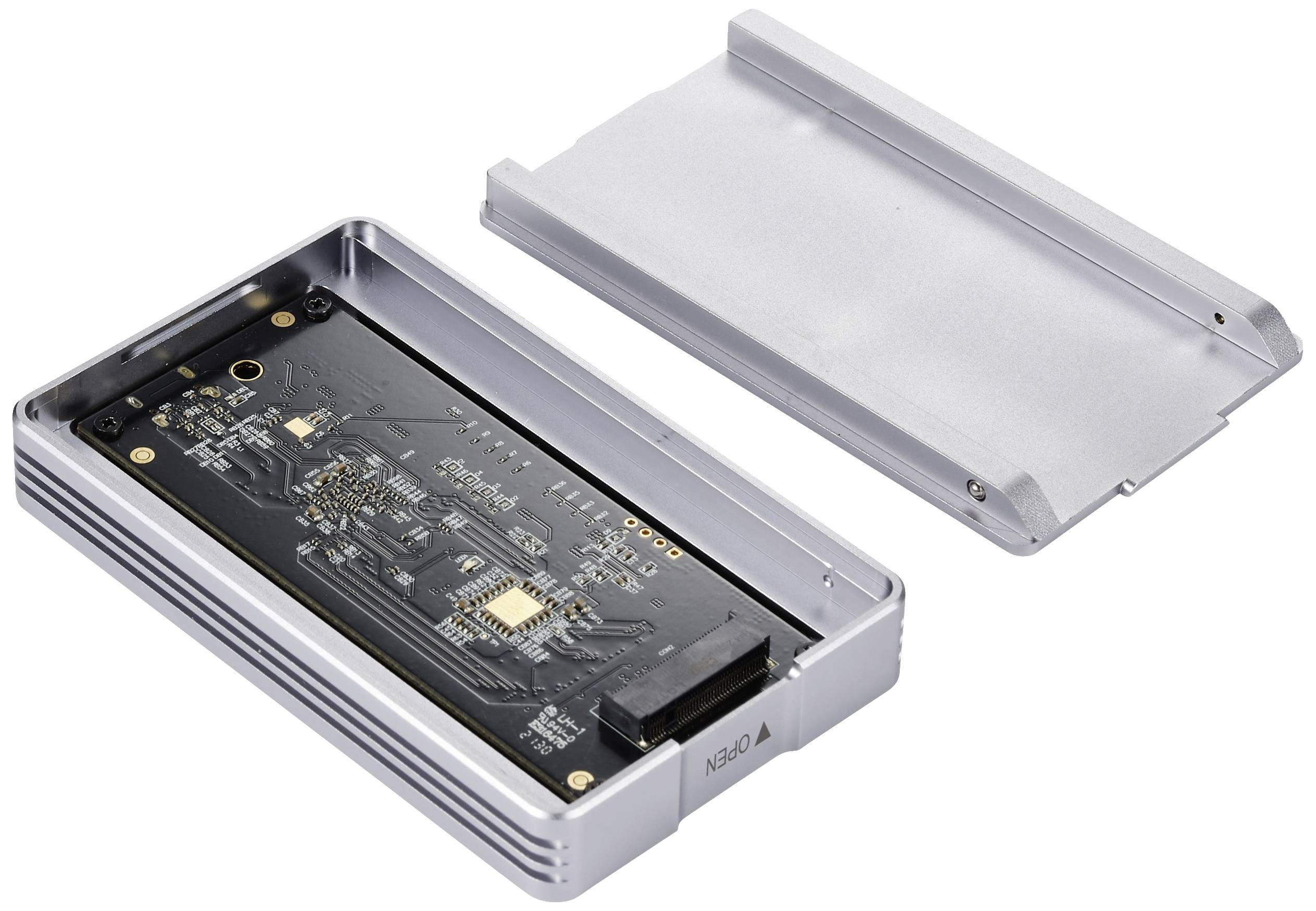 Open casing of a hard drive with visible circuit board and cover.