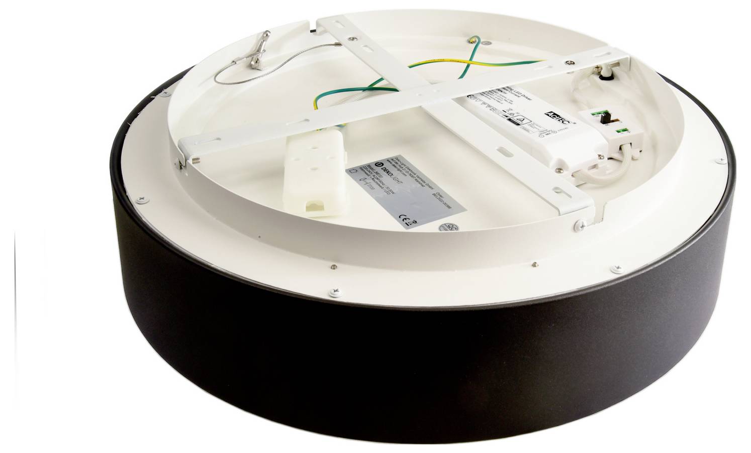 Round ceiling light fixture with white mounting plate and exposed wiring on a black base, shown from below.<br>