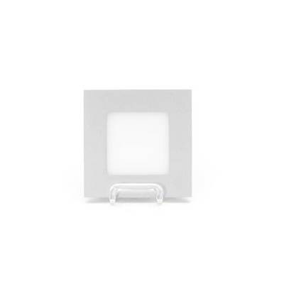 A square, white picture frame stands centrally on a transparent stand against a white background.