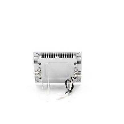White, rectangular lamp with visible cables at the back, positioned on a transparent stand.