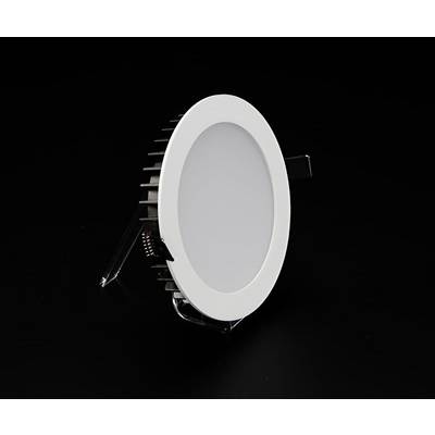 Round, white LED recessed light against a black background. Suitable for modern ceiling installations.