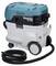 'Makita vacuum cleaner with blue and grey casing, four wheels and a black hose. Model designation on the top surface.'