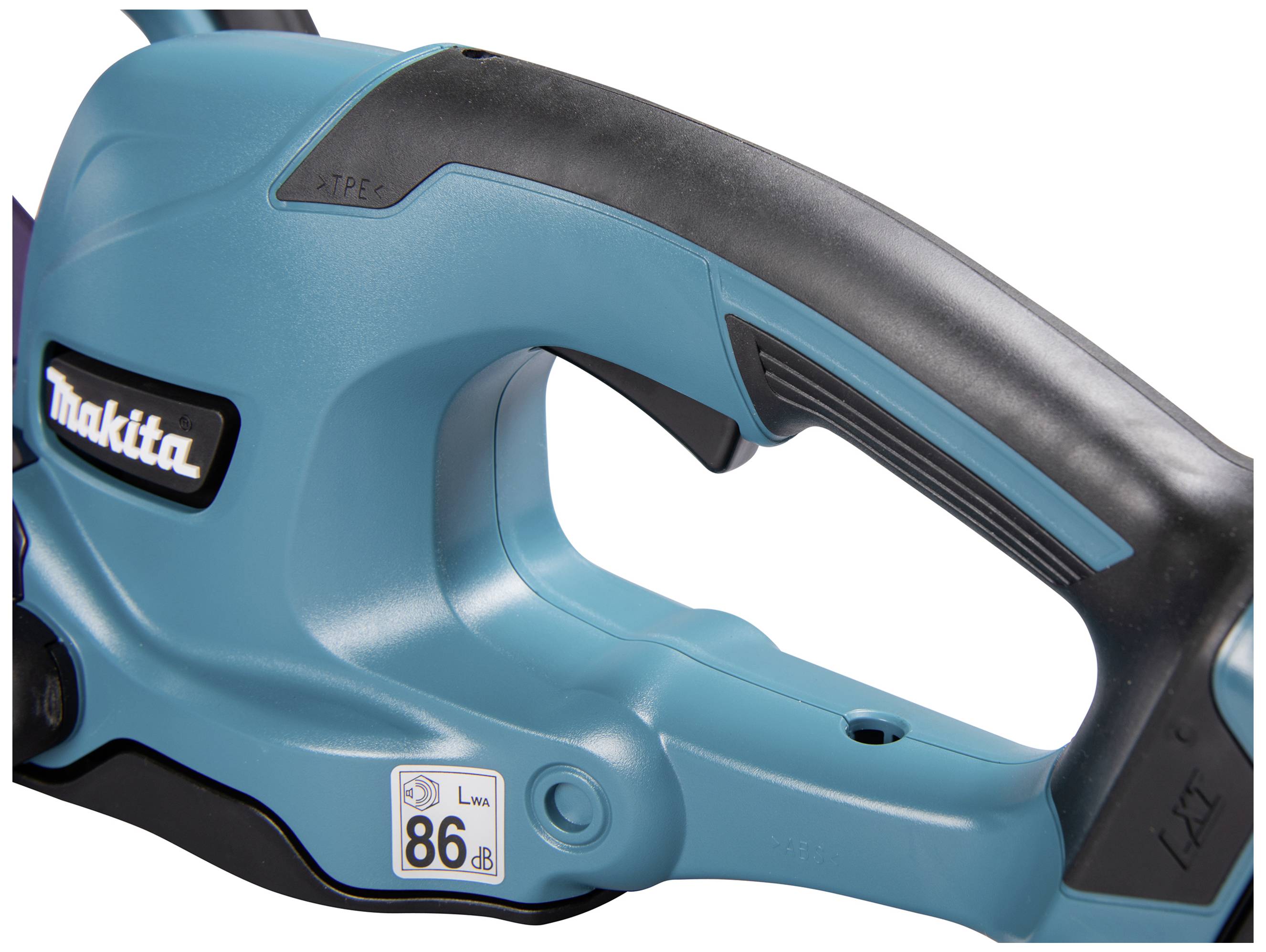 A blue electric Makita garden trimmer, partial view. It is ergonomically shaped and displays a decibel label of 86 dB.
