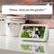 Smart device shows an image of a couple in the garden. A speech bubble above says: 'Alexa, show me the garden.'