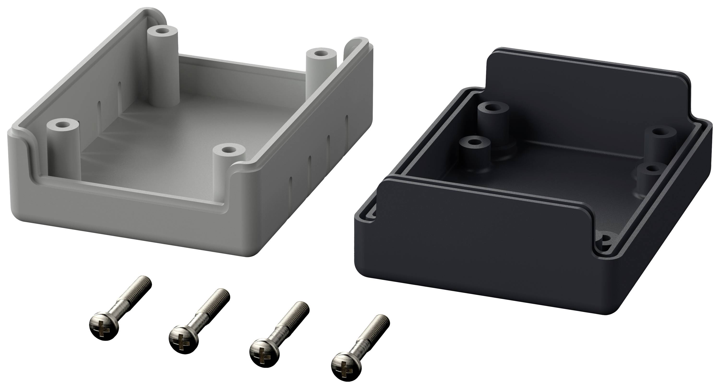 Two rectangular plastic housing halves, one light grey and one black, are lying side by side. Four metal pins are arranged underneath.