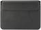 A black leather laptop sleeve lies flat, displaying its smooth surface and stitching.