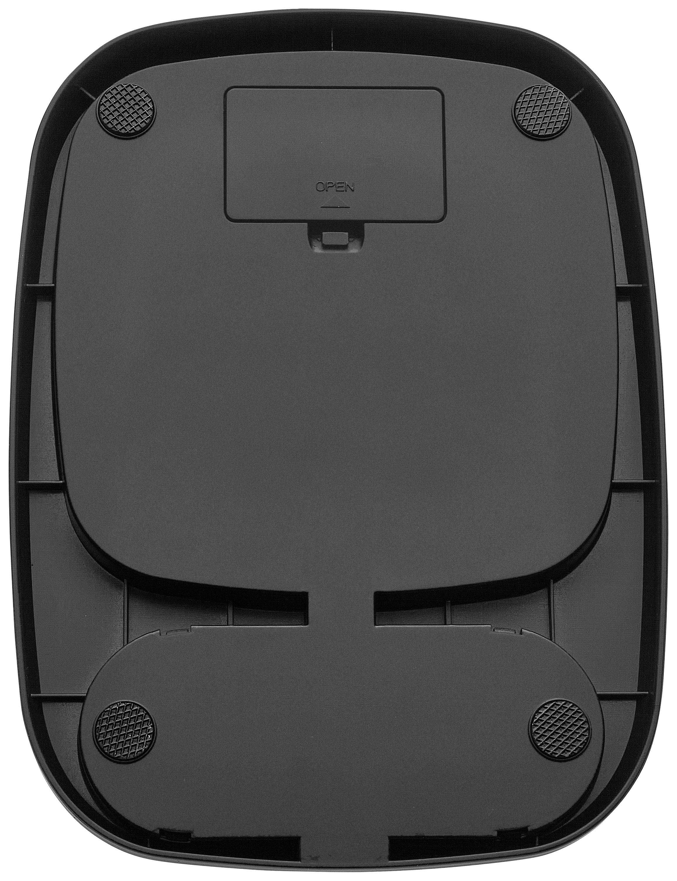 A black, rectangular device with rounded, rubberised feet on its underside, likely an electronic accessory.