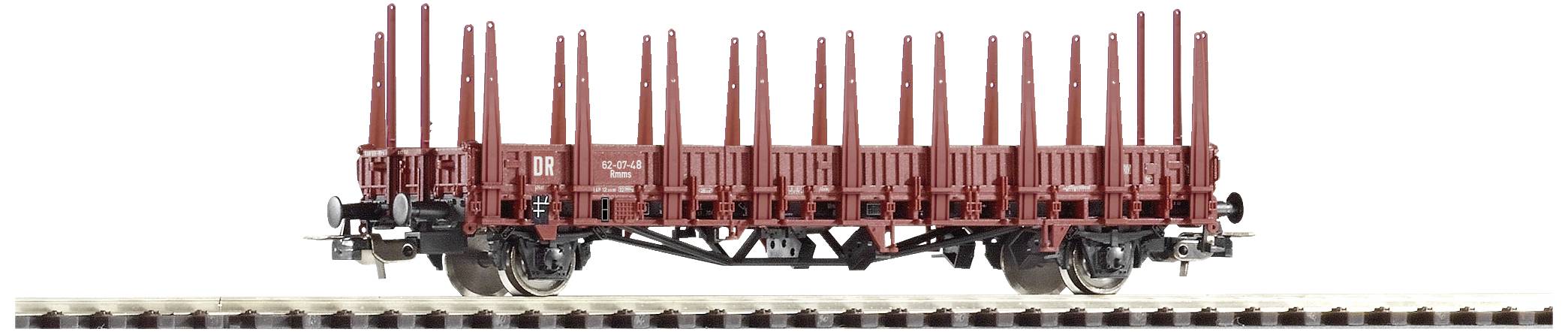 A rust-red model wagon with high side lattices stands on rails. Suitable for the transport of timber or long goods.