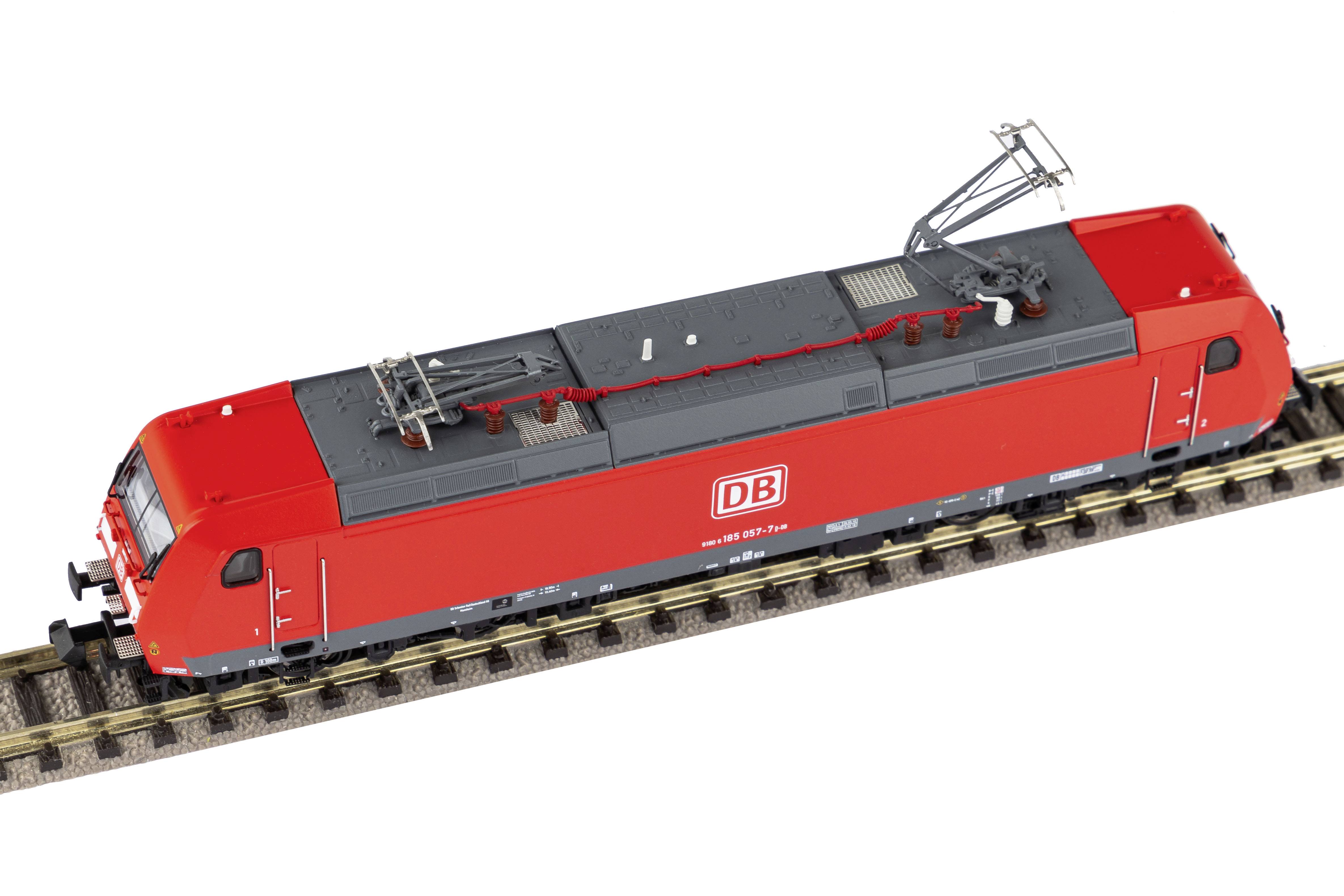 A red model of a Deutsche Bahn locomotive on a track. The locomotive features the DB logo and is intricately designed.