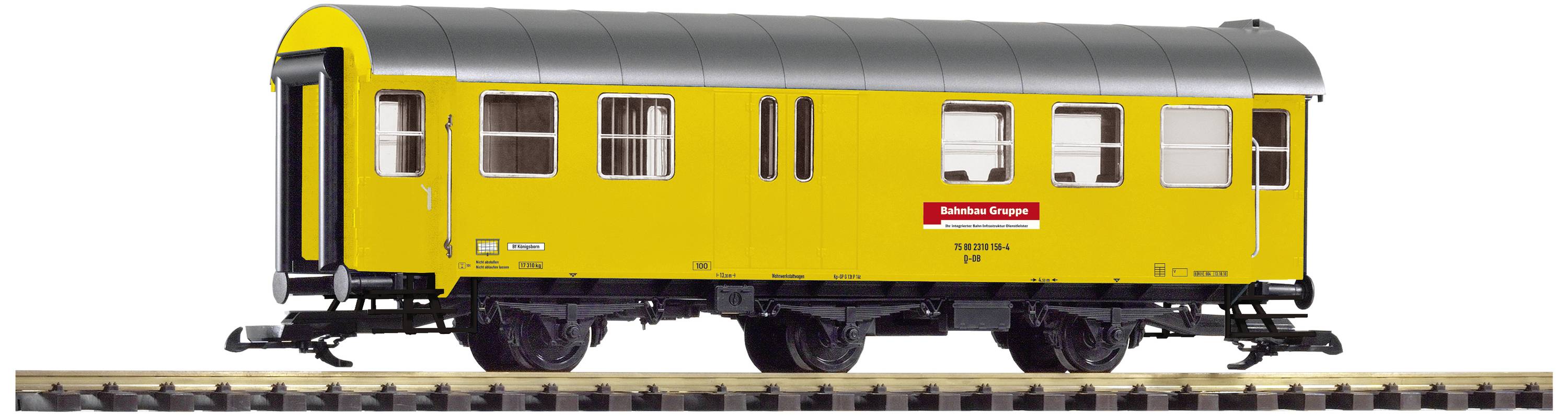 Yellow railway wagon with a roof, four large and two small windows on tracks. Sign with the inscription 'Railway Service Vehicle' on the side.