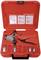A red plastic case containing a pipe bending machine and several bending segments. Instructions are affixed to the inside of the lid.