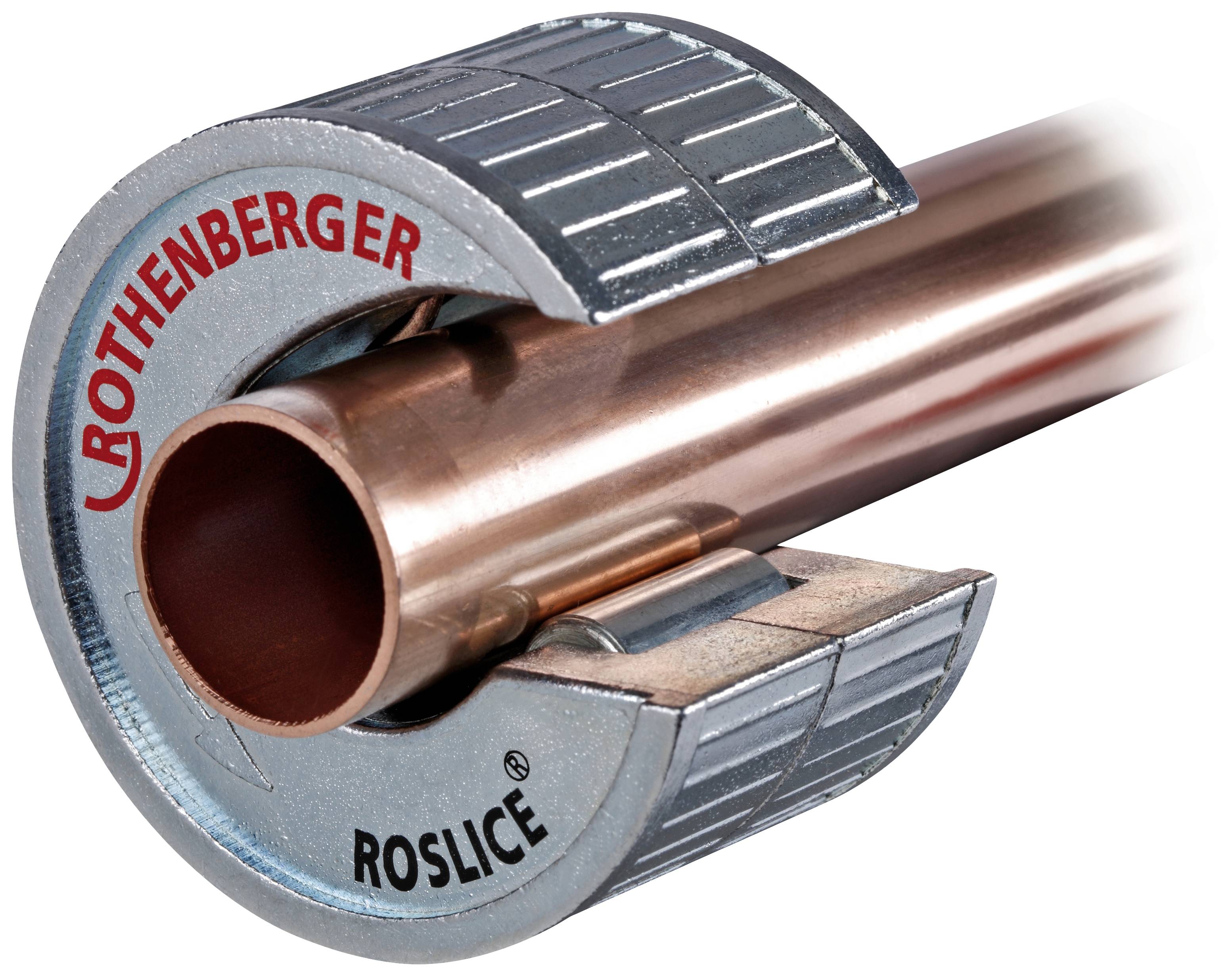 Copper pipe surrounded by a pipe cutter. The tool bears the inscription 'Rothenberger Roslice' in red and black lettering.