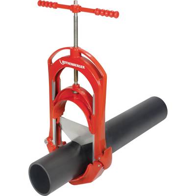 A red tool with a screw mechanism is holding a black pipe. It is likely used for cutting or gripping pipes.