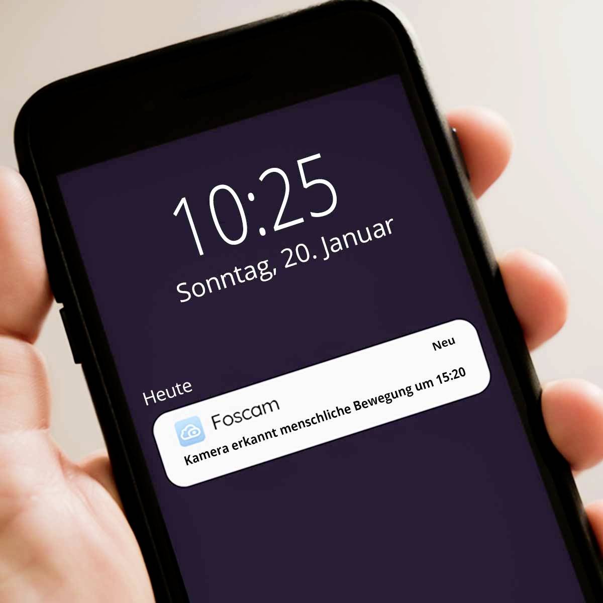A smartphone displays the lock screen, showing the date and time 'Sunday, 20 January, 10:25'. Notification from 'Foscam' about detected movement.