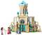 Lego set of a palace with turquoise roofs, three play figures in colourful clothing, and a lantern in the foreground.