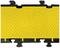 Yellow cable bridge with warning symbols, non-slip surface, black edge pieces at top and bottom, suitable for cable protection.