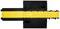 'Black and yellow cable bridge for safely crossing cables; prevents tripping hazard.'