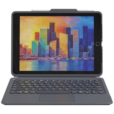 A tablet with keyboard displays a colourful cityscape with skyscrapers and water in the foreground on the screen.