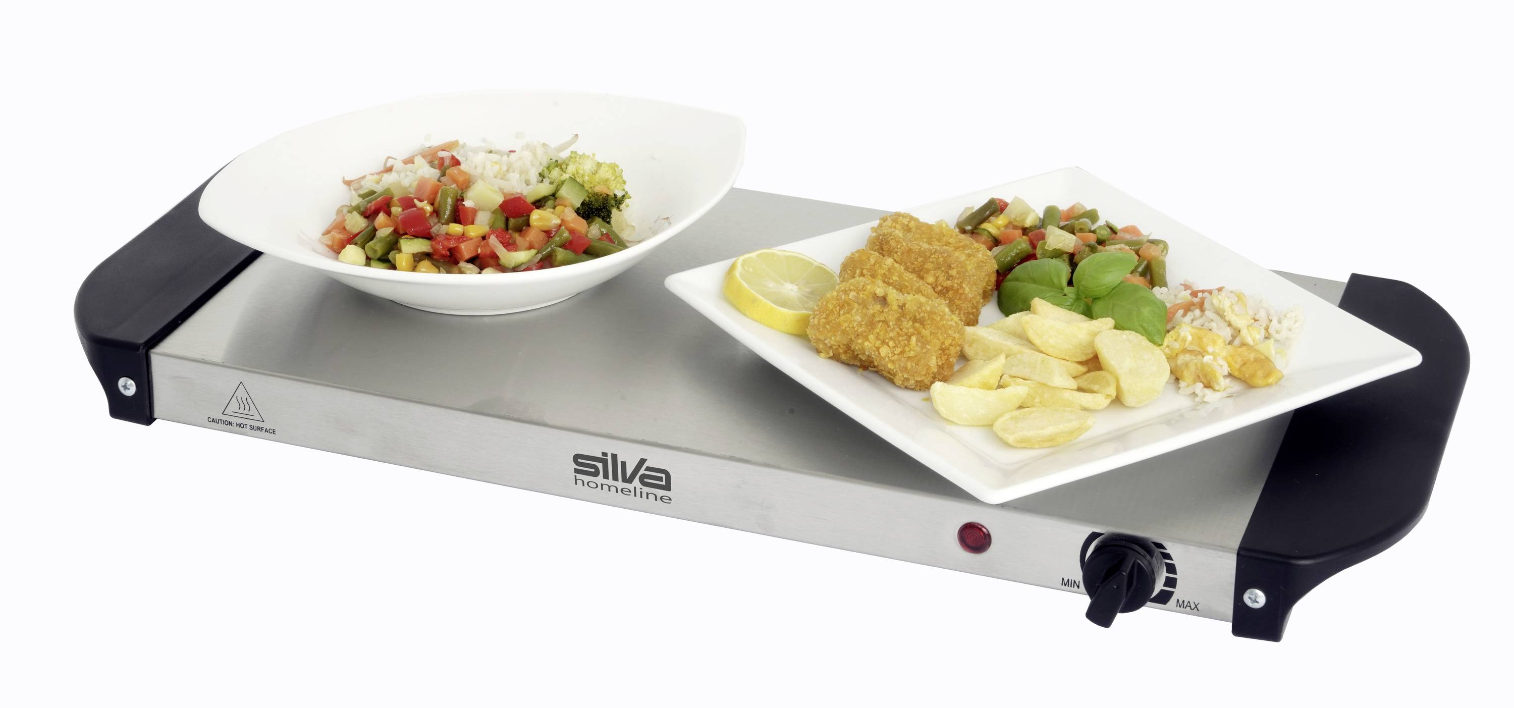 Two plates with different dishes are placed on a heated stainless steel plate. On the left: vegetable rice; On the right: chips, croquettes and vegetables.