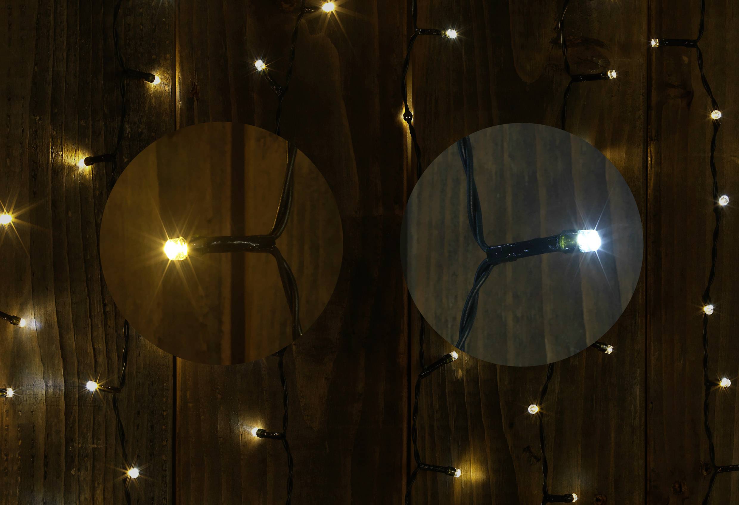 Fairy lights in warm white and cool white, hanging in front of a wooden wall. Warm tones on the left, cool tones on the right, to compare colour temperatures.