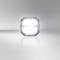 A luminous square light object on a grey background, intensely radiant with light reflections.