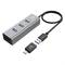 USB-C Hub with three USB 3.0 ports and a USB cable. USB-C to USB adapter included. Device on white background.