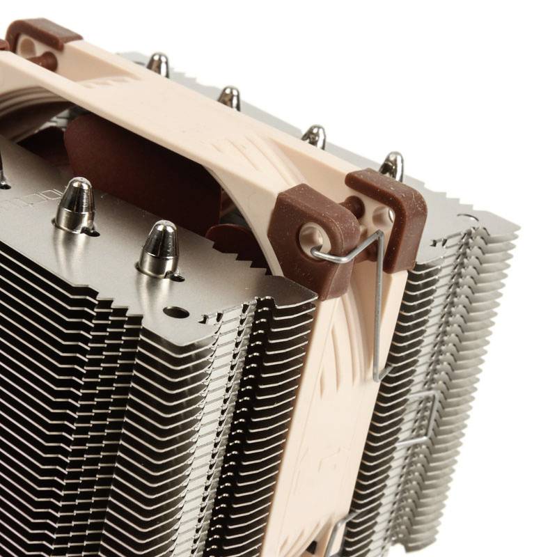 A large CPU cooler with silver heat fins and a beige fan, mounted for heat dissipation in a computer.