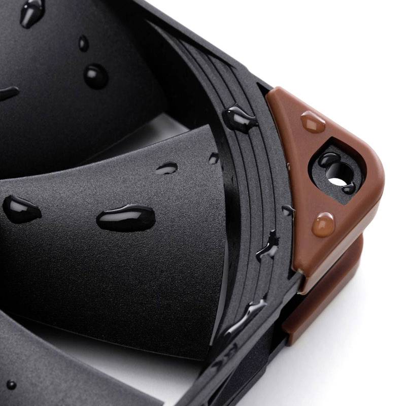 Close-up of a computer case fan with water droplets on the fan blades, representing a cooler, humid climate.