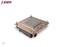 Copper-coloured square computer component with silver screws at the corners and heat sinks. Text 'Q7' bottom left.